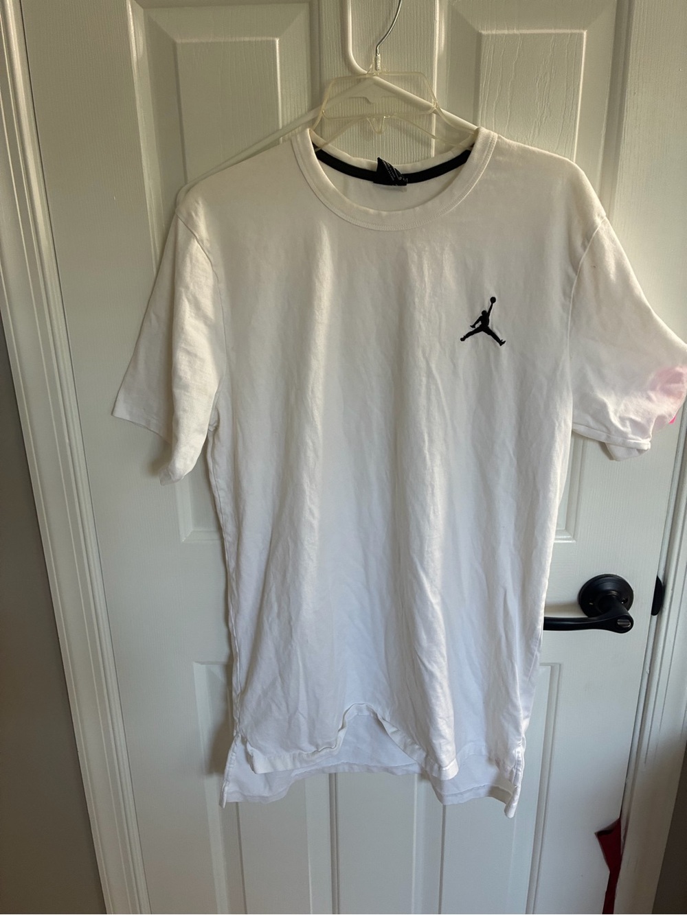 The selected item is a Jordan Jumpman Embroidered Logo T-Shirt in white Large